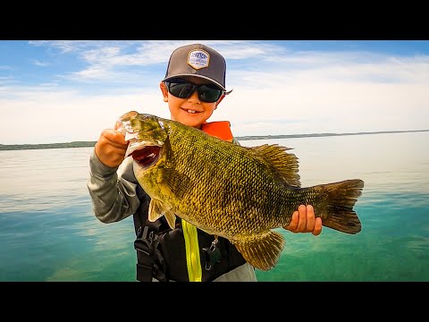8 Year Old Catches GIANT Smallmouth In Crystal CLEAR Water!